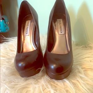 Steve Madden black platform heels.